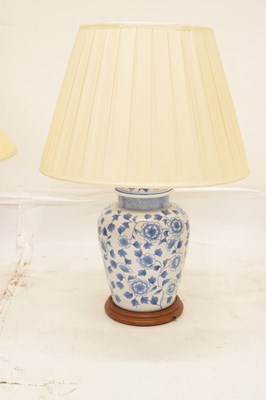 Lot 426 - Three modern Chinese blue and white table lamps