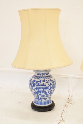 Lot 426 - Three modern Chinese blue and white table lamps