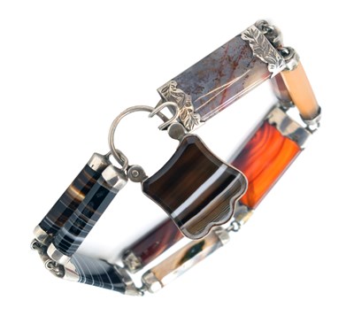 Lot 61 - Victorian banded agate and carnelian unmarked silver panel bracelet