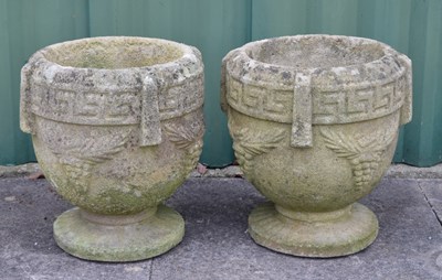 Lot 810 - Pair of reconstituted stone garden urns