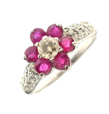 Lot 34 - Ruby and diamond daisy cluster ring
