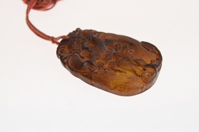 Lot 349 - Chinese carved brown jade pendant