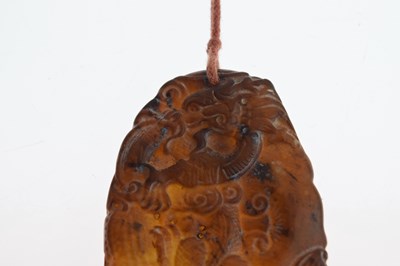 Lot 349 - Chinese carved brown jade pendant