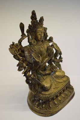 Lot 596 - Sino-Tibetan gilt copper alloy figure of Cundi Avalokiteshvara (Zhunti Guanyin)