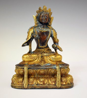 Lot 353 - Tibetan two-colour bronze figure of Buddha Vajradhara or Vajrasattva