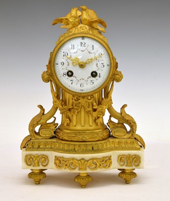 Lot Late 19th century French gilt brass, bronze and white marble mantel clock