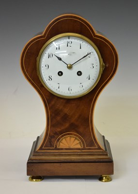 Lot 676 - Early 20th century inlaid mahogany trefoil-balloon mantel clock