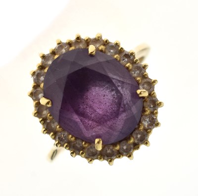 Lot 49 - 18ct gold, amethyst and diamond cluster ring