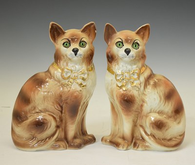 Lot 527 - Pair of Staffordshire fireside cats