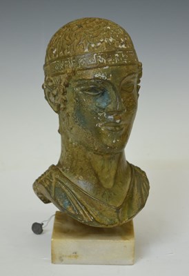 Lot 449 - Museum copy tinted resin bust of Charioteer of Delphi