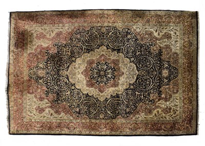 Lot 660 - Large Indian machine-made wool carpet