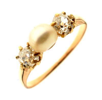 Lot 14 - Pearl and diamond yellow metal ring