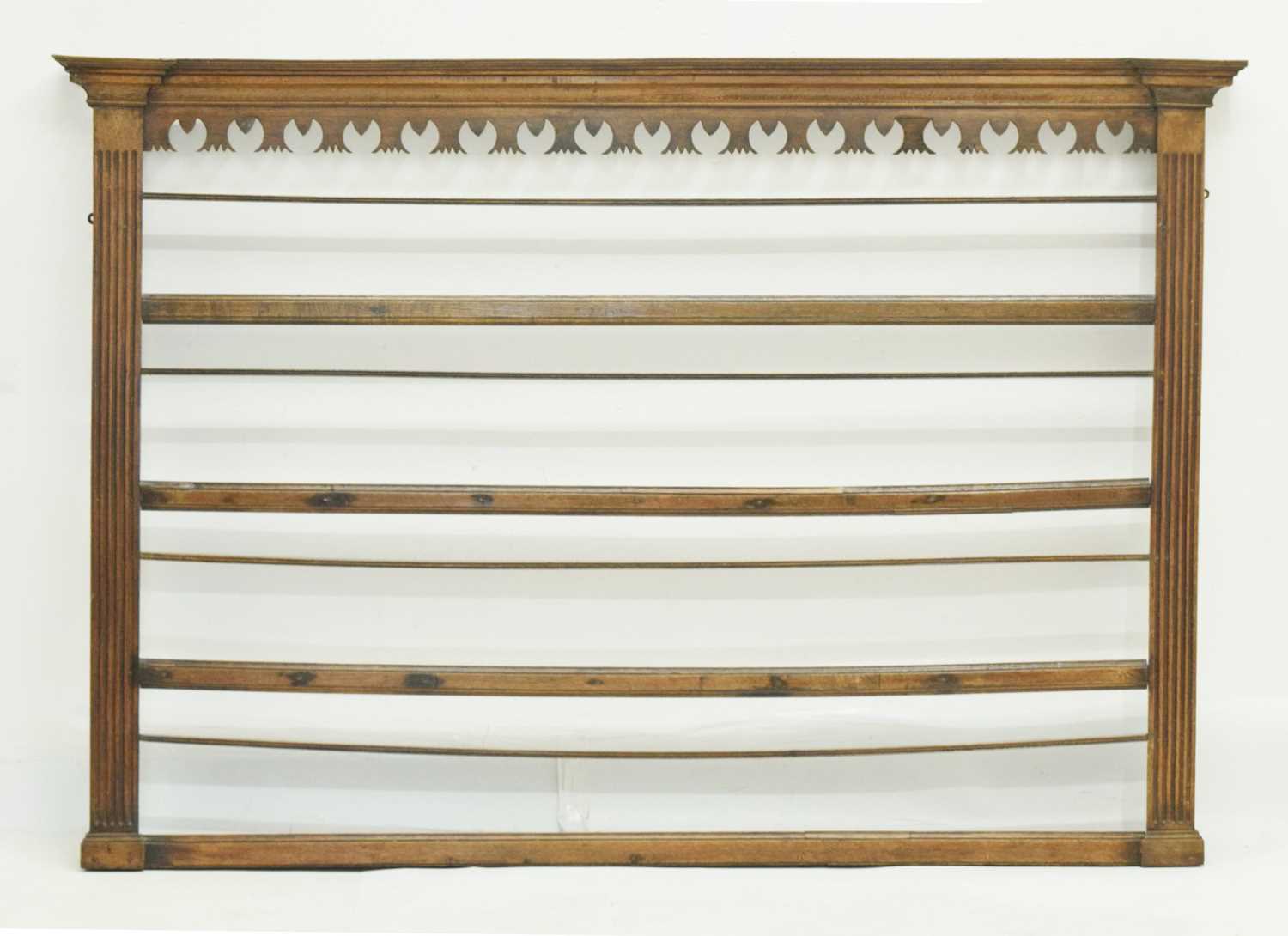 Lot 699 - George III oak dresser rack