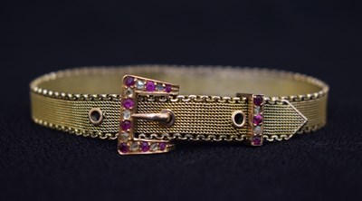 Lot 56 - Victorian ruby and diamond 9ct gold bracelet modelled as a belt