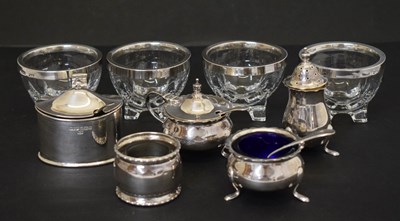 Lot 220 - Set of four Victorian silver mounted glass table salts, a George V condiment set, etc