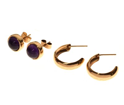 Lot 129 - Pair of amethyst 9ct gold stud earrings