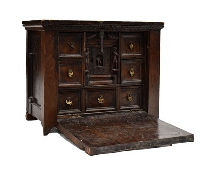 Lot 536 - North Italian carved and veneered walnut 'Bambocci' table cabinet