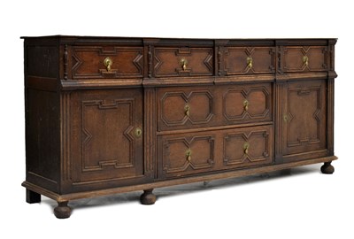 Lot 542 - 17th century and later geometric oak dresser base