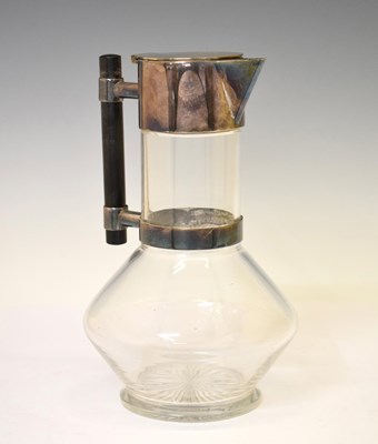 Lot 219 - Manner of Christopher Dresser - Electroplated claret jug