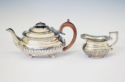 Lot 263 - George III silver teapot and a later George V silver cream jug