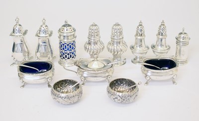 Lot 220 - Quantity of silver condiments to include a George VI three-piece condiment set