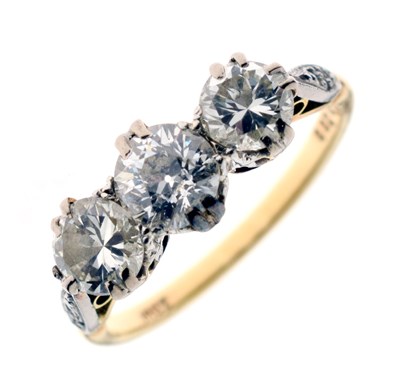 Lot 7 - 18ct yellow gold three-stone diamond ring