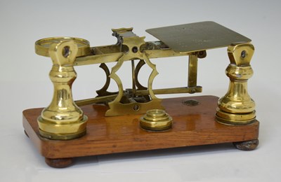 Lot 340 - Early 20th century set of brass and oak letter scales