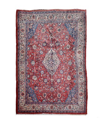 Lot 668 - Iranian red ground wool rug