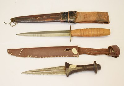 Lot 481 - Double edged African dagger and 'commando'-type dagger