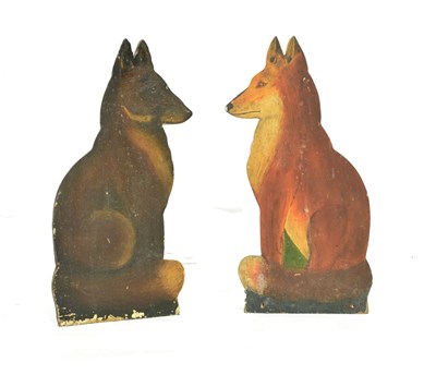 Lot 233 - Pair of Folk Art wooden door stops modelled as foxes