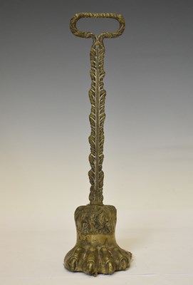 Lot 343 - 19th century brass lion's paw doorstop