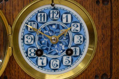 Lot 479 - J. W. Benson - late Victorian Aesthetic Movement tile-inset oak three-piece clock garniture