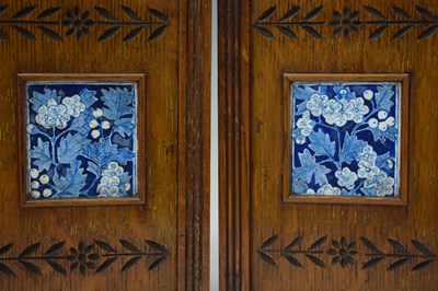 Lot 479 - J. W. Benson - late Victorian Aesthetic Movement tile-inset oak three-piece clock garniture