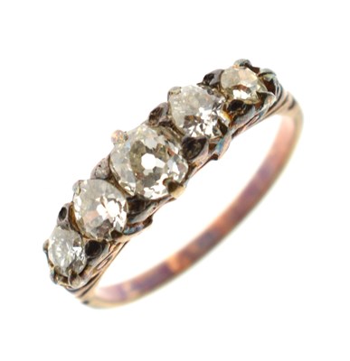 Lot 8 - Late 19th century diamond yellow metal ring, five graduated old cut diamonds