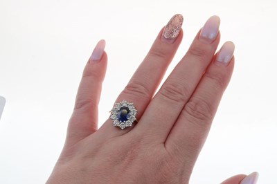 Lot 14 - Sapphire and diamond  cluster ring