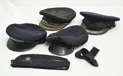 Lot 343 - Two police officer's caps and three others