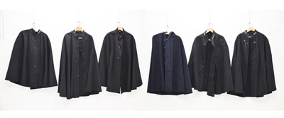 Lot 345 - Five police issue officer's capes together with a similar hooded cape