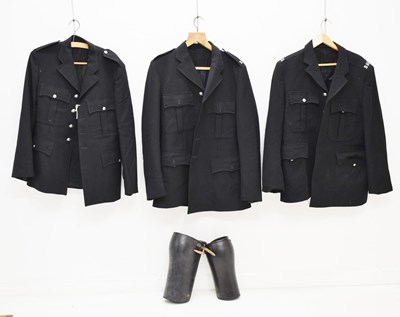 Lot 346 - Three police issue constable's uniform jackets together with two pairs of  black leather gaiters