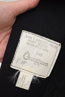 Lot 346 - Three police issue constable's uniform jackets together with two pairs of  black leather gaiters