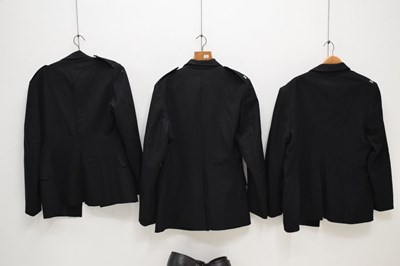 Lot 346 - Three police issue constable's uniform jackets together with two pairs of  black leather gaiters