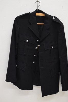 Lot 346 - Three police issue constable's uniform jackets together with two pairs of  black leather gaiters