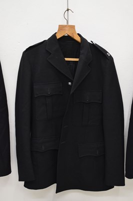 Lot 346 - Three police issue constable's uniform jackets together with two pairs of  black leather gaiters