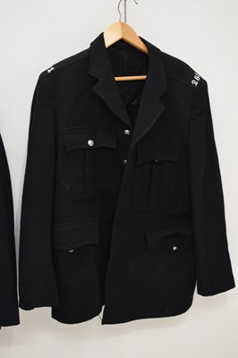 Lot 346 - Three police issue constable's uniform jackets together with two pairs of  black leather gaiters