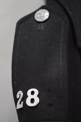 Lot 346 - Three police issue constable's uniform jackets together with two pairs of  black leather gaiters