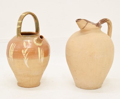 Lot 540 - French terracotta water jug and another (2)