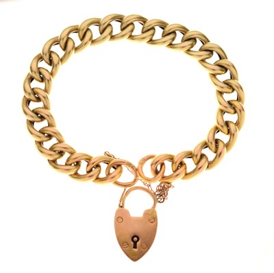 Lot 124 - Curb link charm bracelet with heart-shaped padlock, both stamped '15c'