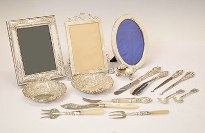 Lot 221 - Three silver framed picture frames, a pair of Victorian silver bonbon dishes, etc