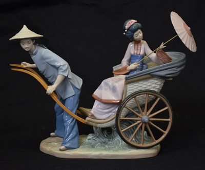 Lot 549 - Lladro - Porcelain figure group - 'Rickshaw Ride'