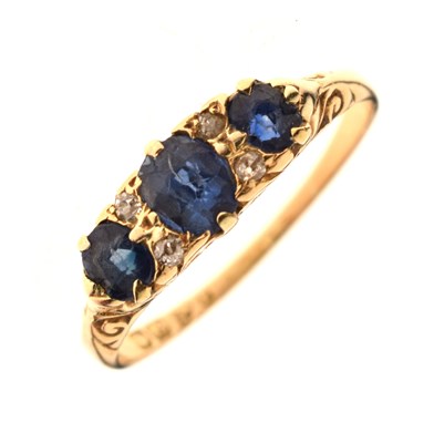 Lot 14 - Sapphire and diamond 18ct yellow gold boat head ring