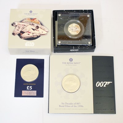 Lot 304 - Charles III UK 'Star Wars' silver proof coin and two 007 £5 coins